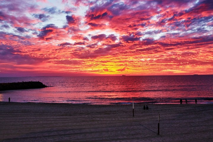 a sunset over a body of water