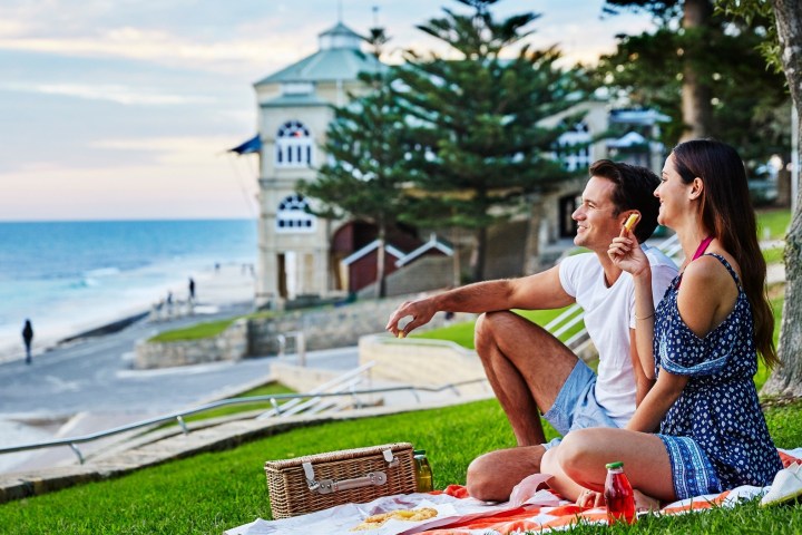 Ben Swift sitting at a picnic table